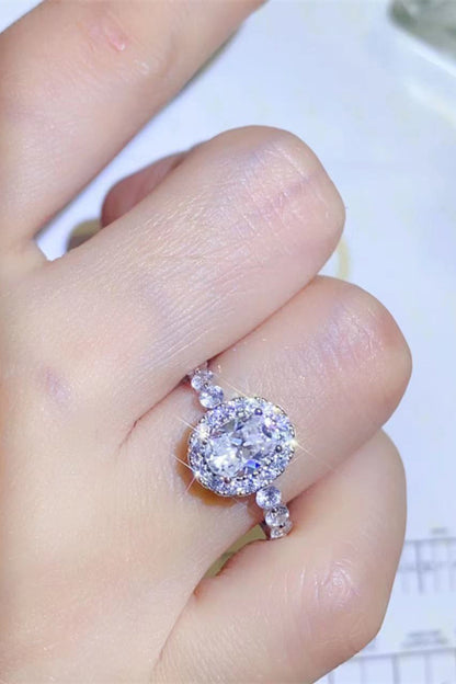 Adored 1 Carat Oval-Cut Sparkala™ Platinum Over Pure Sterling Silver Halo Ring