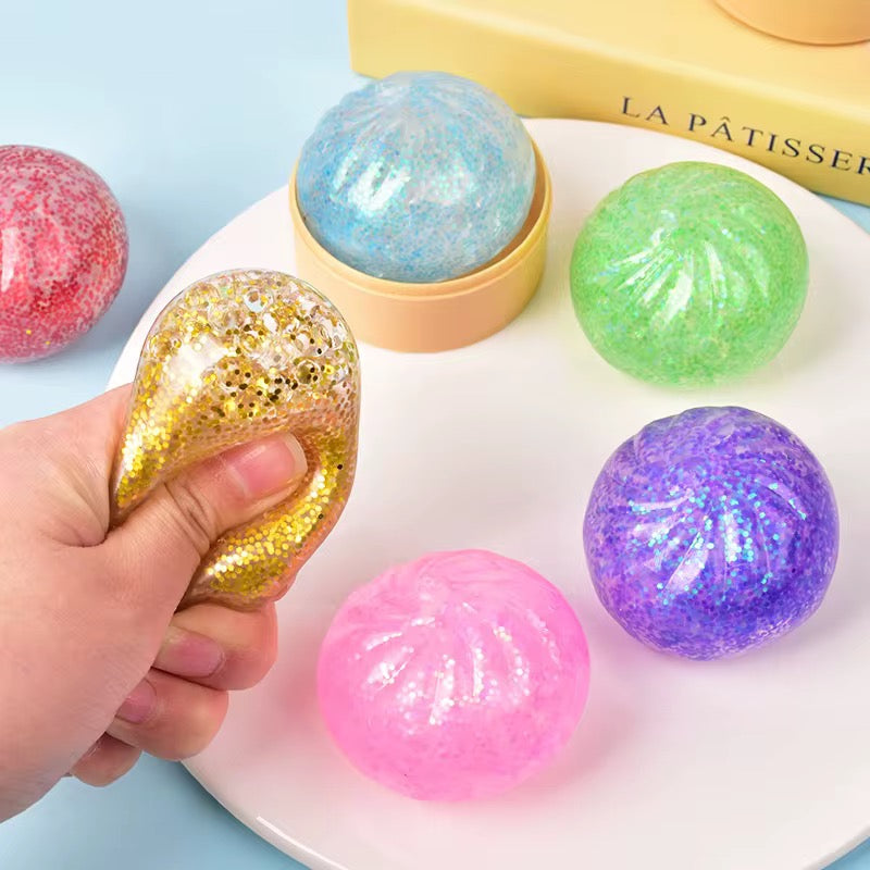 Mini 5cm Glitter Dumpling Squishy Fidget Toy in Steamer Basket – Water Bead & Glitter Gel Stress Relief Ball