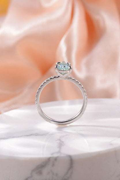1.5 Carat Teardrop Shape Blue Pear-Cut Sparkala™ Platinum Over Pure Sterling Silver Ring