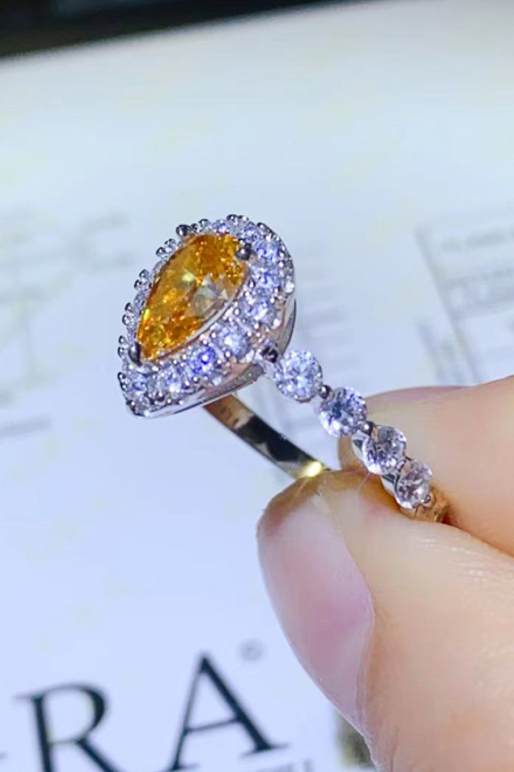 1 Carat Yellow Pear-Cut Sparkala™ Contrast Teardrop Ring (Platinum Over Pure Sterling Silver)