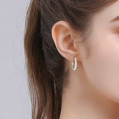 Pure Sterling Silver Sparkala™ Huggie Earrings