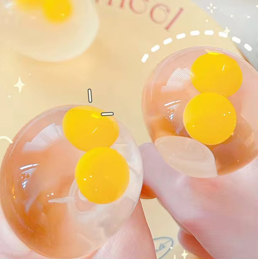 Double the Yolk, Double the Chill: The "Egg-tra" Clear Stress Relief Squeeze!